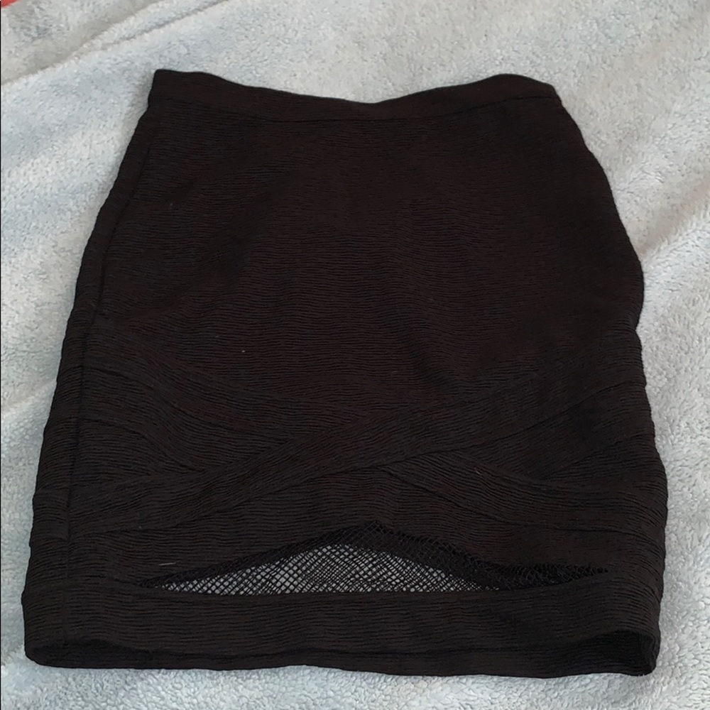 A mini body con skirt